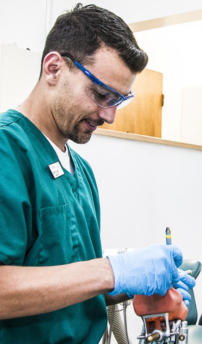 Dental hygiene student receives practical training.